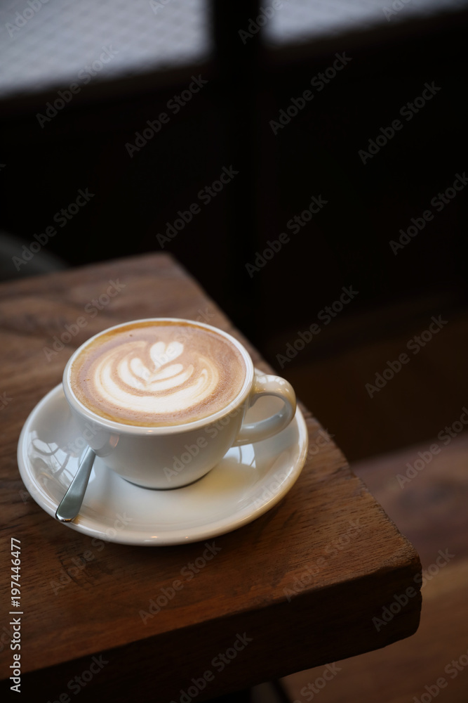 Cappuccino coffee cup on wood background Cappuccino coffee cup on wood background