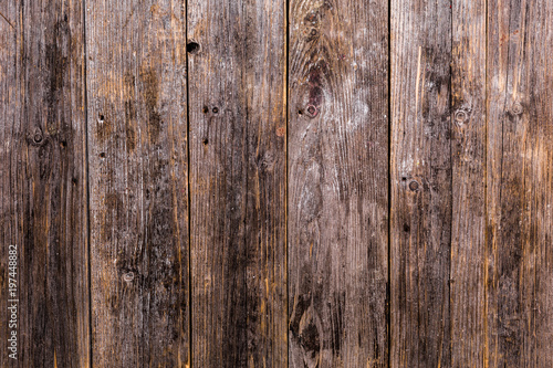 The old natural wooden boards are dark brown with a beautiful deep clear texture