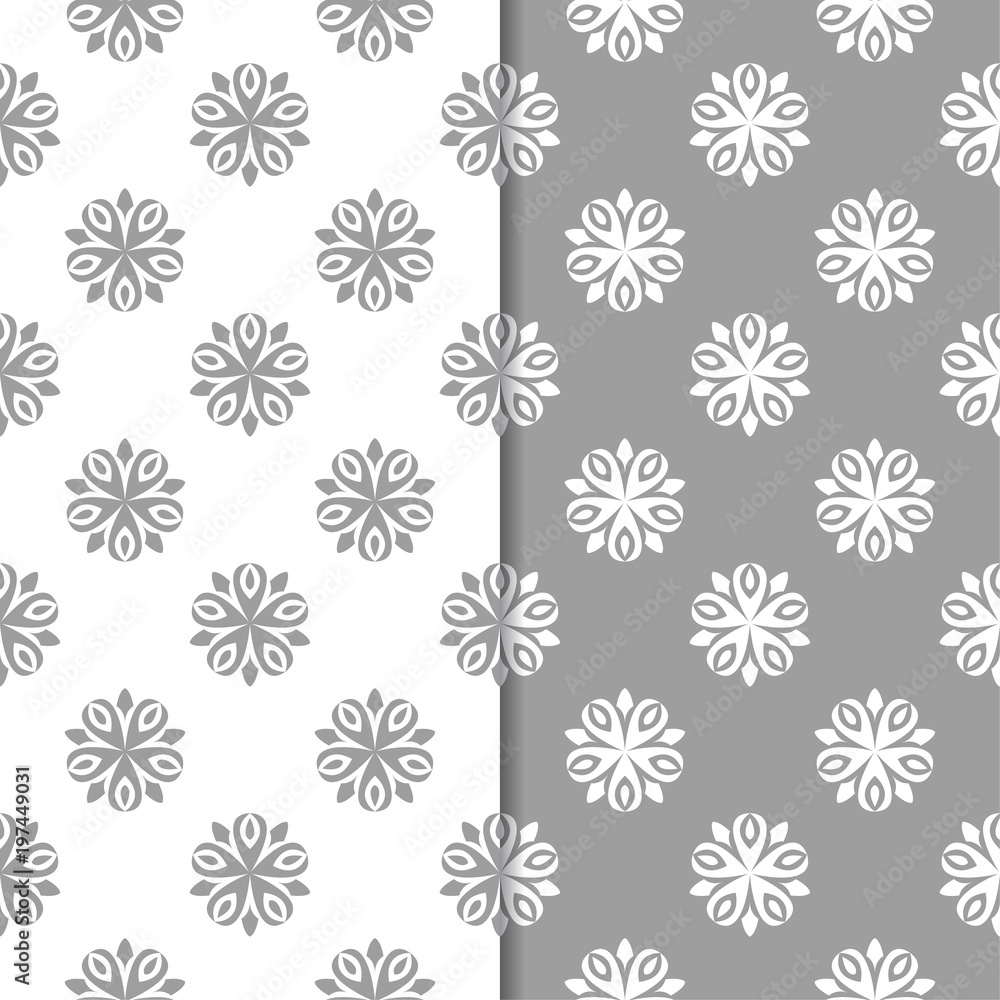 White and gray floral backgrounds. Set of seamless patterns White and gray floral backgrounds. Set of seamless patterns