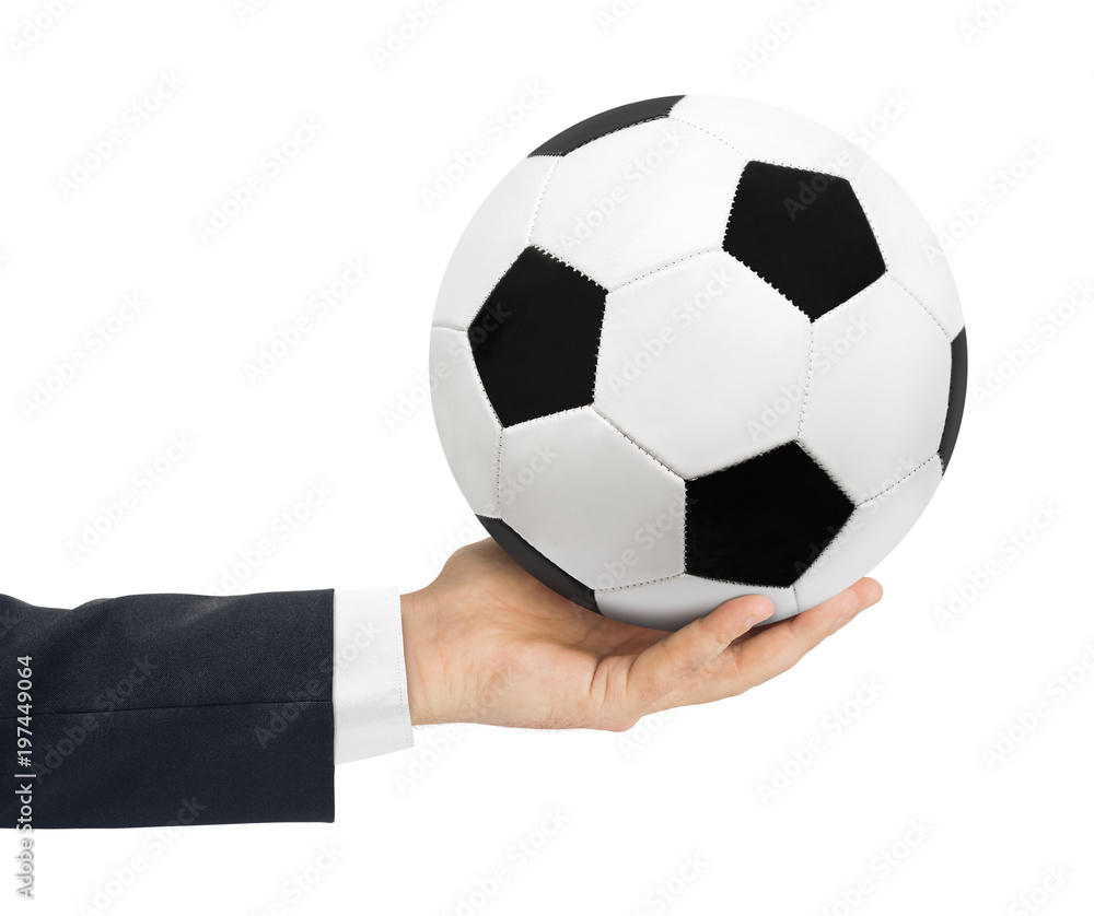 Hand and soccer ball