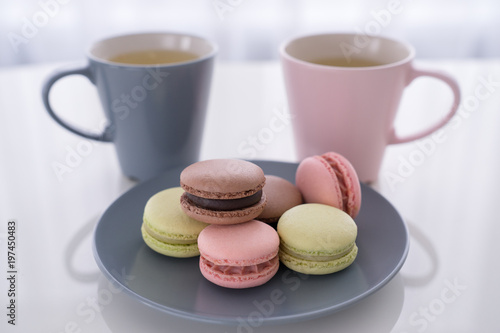 Macaroon and Coffee or tea on white table