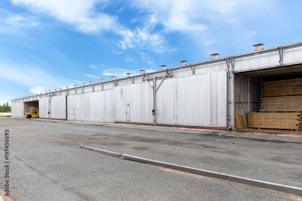 Fototapeta premium Warehouse of sawn timber on a sawmill