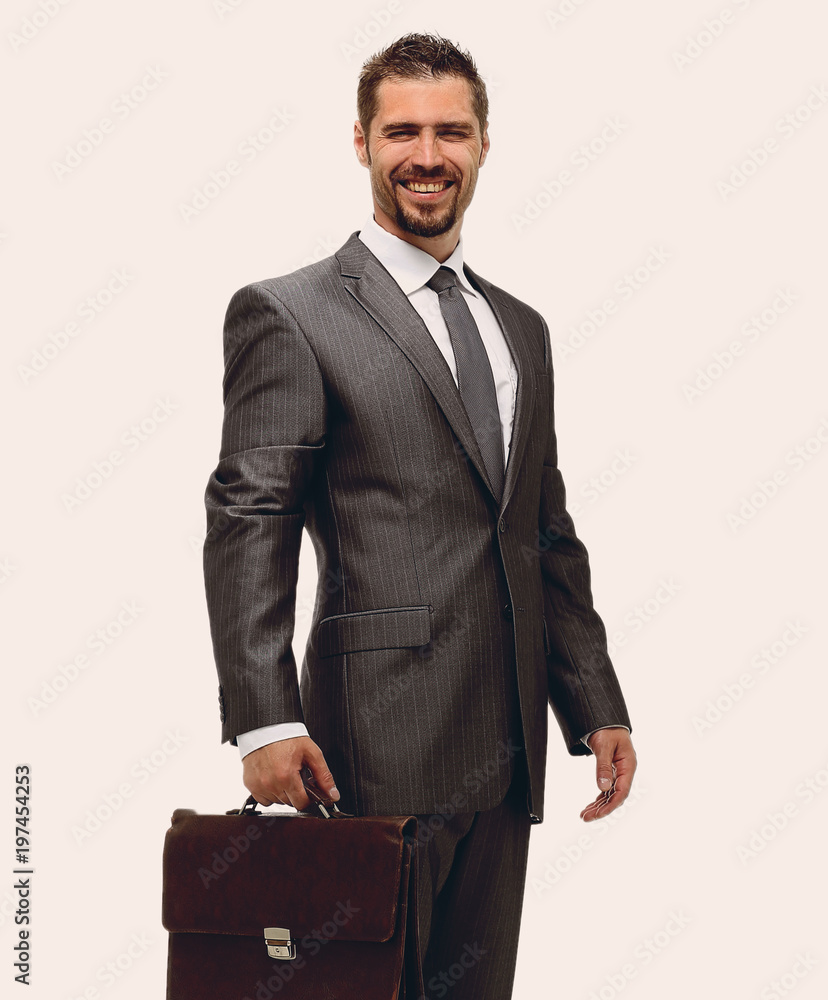 in full growth.businessman with a briefcase. in full growth.businessman with a briefcase.