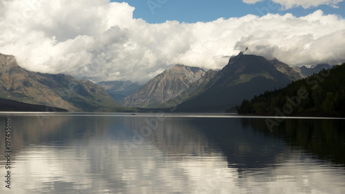 Fototapeta Naklejka Na Ścianę i Meble -  Canoe Rowboat Lake McDonald Glacier National Park Montana