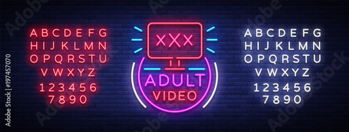 Adult video neon sign. Design template, neon logo xxx video, sex industry, light banner, night bright light advertisement. Vector illustration. Editing text neon sign photo