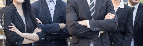 Horizontal of teamwork and confident of business team, businessman and cross one's arm.