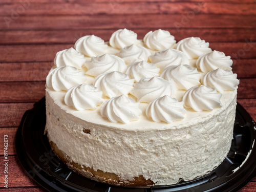 Delicious light ice cream cake with roses cream photo