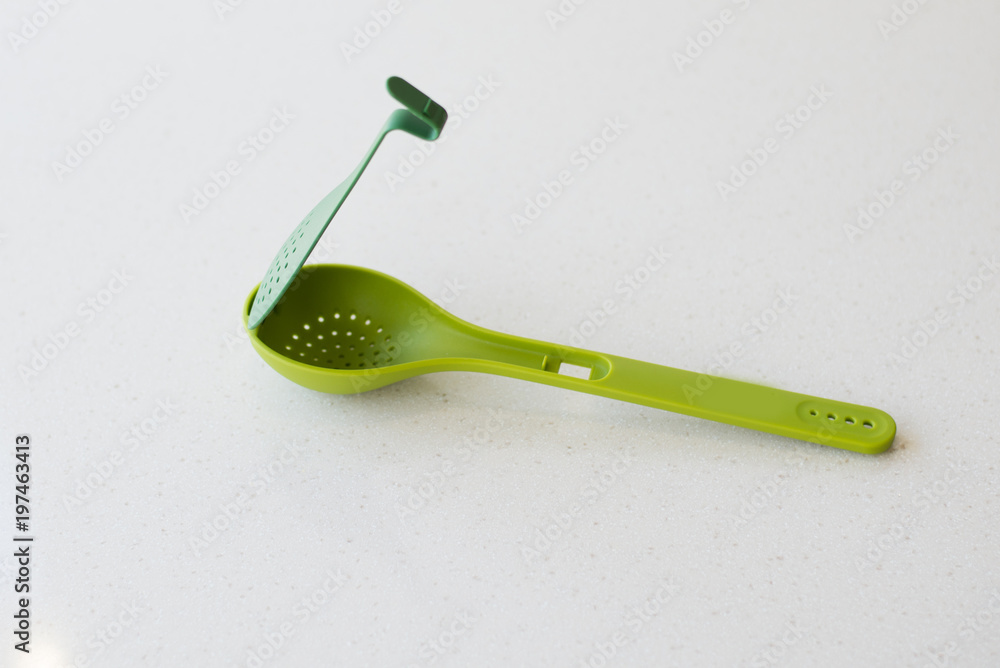 Large plastic spoons on white background Stock Photo