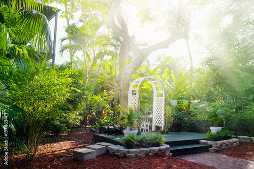 House courtyard and the garden of the Ernest Hemingway Home and Museum in Key West, Florida.  photo