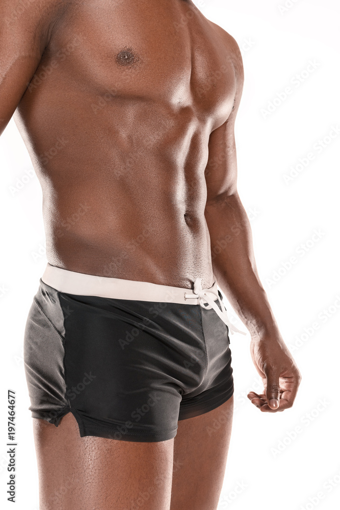 Fit young man with beautiful torso isolated on white background Fit young man with beautiful torso isolated on white background