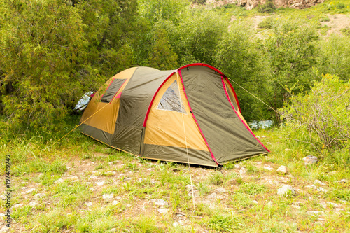 Tourist tent on nature in the mountains