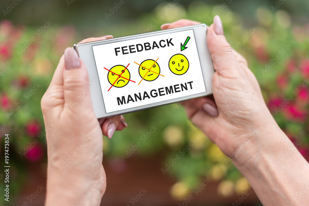 Feedback management concept on a smartphone Feedback management concept on a smartphone