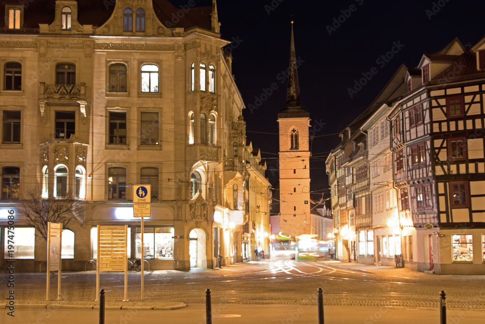 Erfurt marktstraße at night with tram