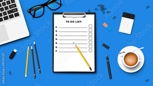 Empty List On Paper Holder. Top View On The Working Table.