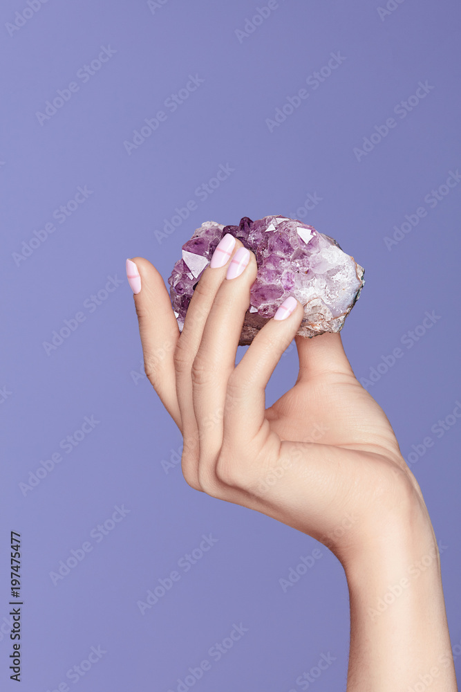 Manicure. Hand With Stylish Nails Holding Purple Gemstone Manicure. Hand With Stylish Nails Holding Purple Gemstone