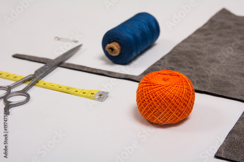Background for tailor fabric yarn and sewing tools photo
