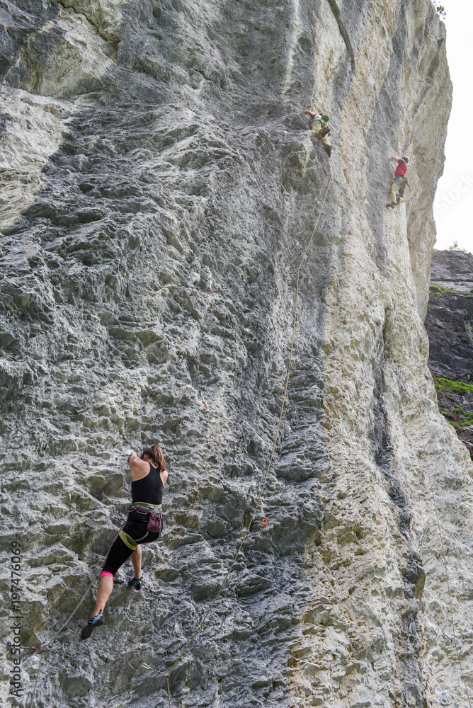 Fototapeta premium People climbing on the rock at Engelberg on Switzerland
