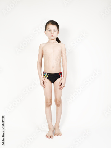 Teenage boy in swim trunks hi-res stock photography and images - Alamy