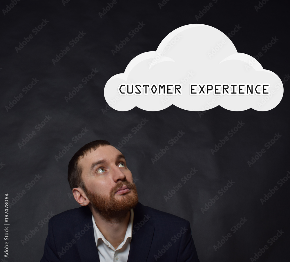 Above the businessman hangs a cloud with the inscription:CUSTOMER EXPERIENCE Above the businessman hangs a cloud with the inscription:CUSTOMER EXPERIENCE