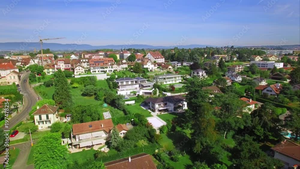 4K aerial shot - flying over a little village - European country side. Residential area, beautiful properties & real estate 4K aerial shot - flying over a little village - European country side. Residential area, beautiful properties & real estate