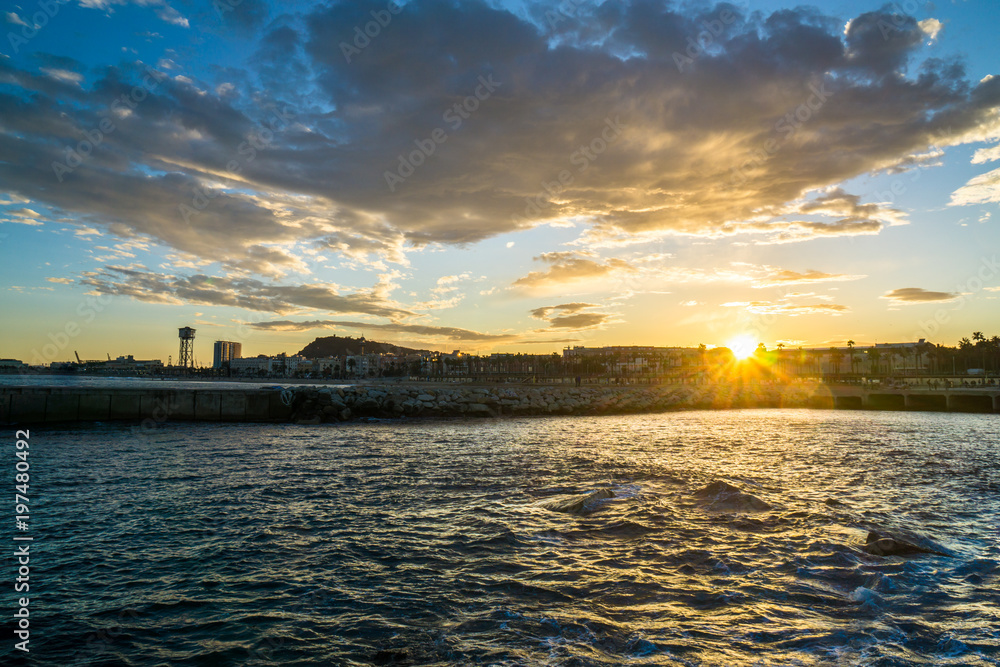 Naklejka premium View to the shore with beautiful sea and sunset