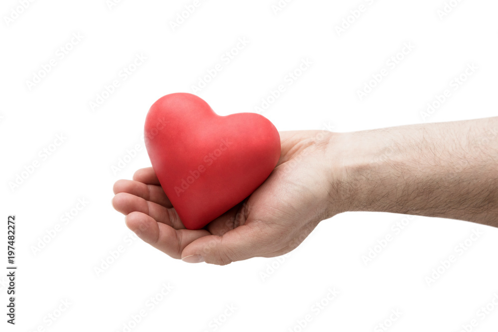 Red heart in man's hand