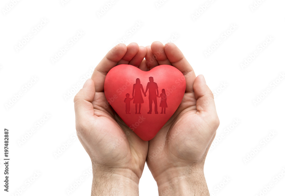 Red heart with imprinted family shape in man's hands. Red heart with imprinted family shape in man's hands.