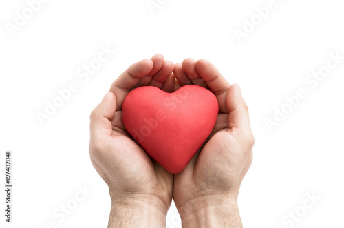 Red heart in man s hands. Health insurance or love concept 