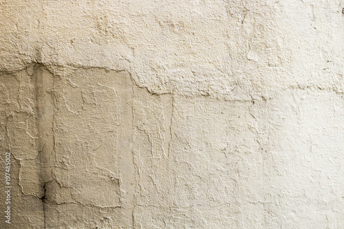 Yellow cement wall background texture