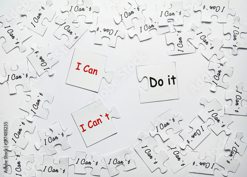 I can or I can`t do it. Words of motivation. Concept motivational message of ability and possibility. I can`t and you can are written on puzzle pieces.