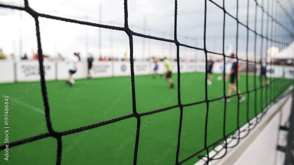POV of supporter watching amateur teams play soccer game, active lifestyle POV of supporter watching amateur teams play soccer game, active lifestyle