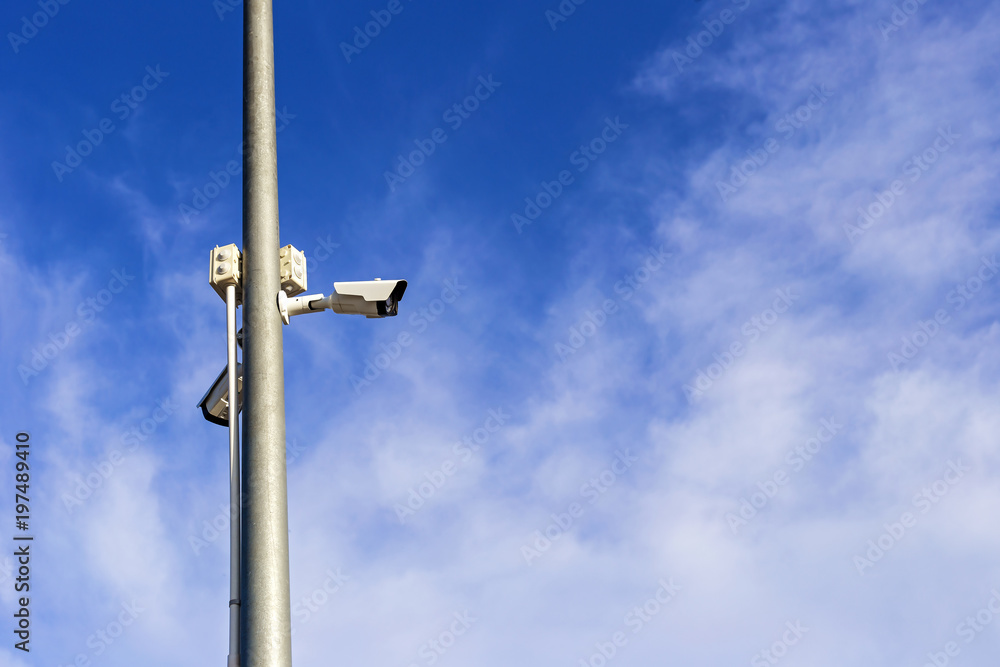 The security camera stuck on light poles for security in the communities. The security camera stuck on light poles for security in the communities.