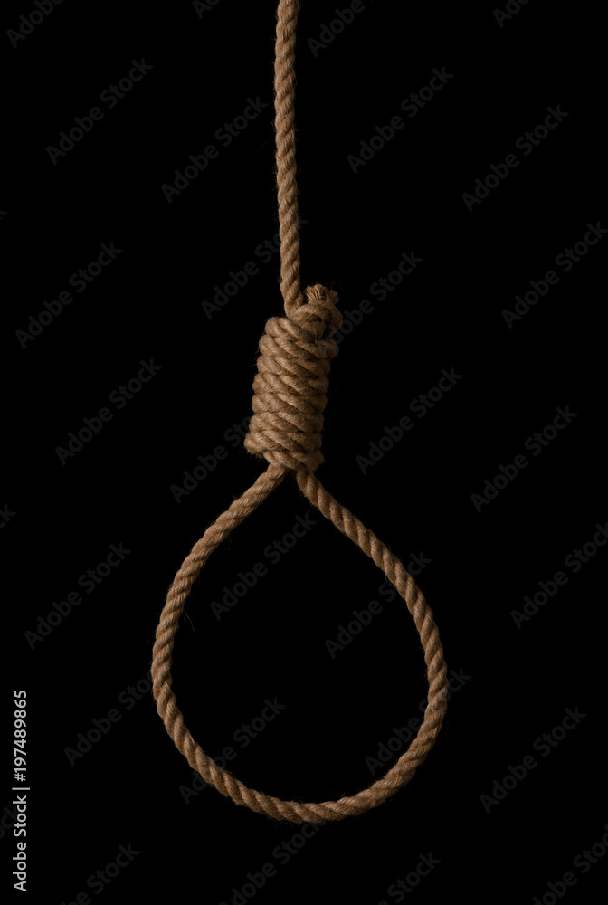 Rope noose with tight hangman knot isolated on black background Rope noose with tight hangman knot isolated on black background