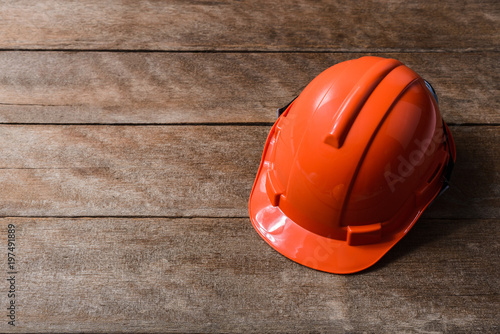 Orange protective safety helmet photo