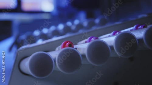 Blood samples stored in a hospital laboratory - moving machine. Samples in constant motion to keep the blood moving