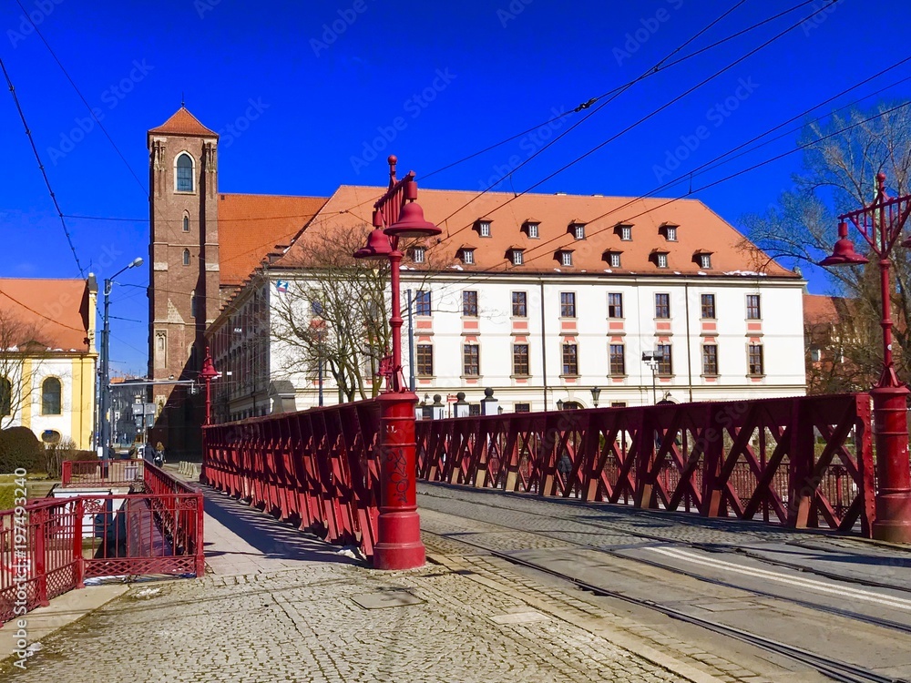 Obraz premium architecture, house, city, building, street, town, europe,wroclaw, travel, poland, sky, blue, urban, medieval, castle, panorama, church, buildings, view, river, ancient, history, exterior, houses,