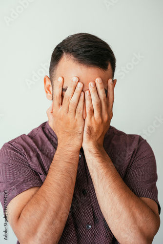 Photography Young Man Covering Face with Hands