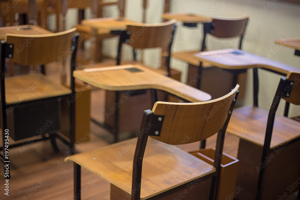 Classic classroom chair with arm bar by nobody in class use for lecture or education Classic classroom chair with arm bar by nobody in class use for lecture or education