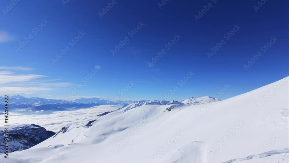 4K Beautiful Mountain Timelapses on a Winter day - Valley with clouds. Breathtaking panorama Time lapse in Crans-Montana, Switzerland - Sunny day, perfect clouds 4K Beautiful Mountain Timelapses on a Winter day - Valley with clouds. Breathtaking panorama Time lapse in Crans-Montana, Switzerland - Sunny day, perfect clouds