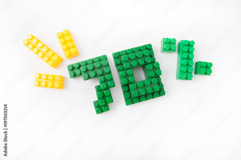 Naklejka premium Numbers from colored cubes on a white background, discounts