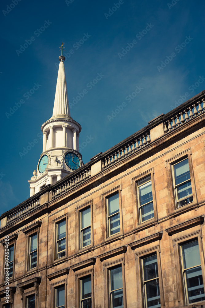 Old Hospital Clock Tower and Sandstone Terrace in Glasgow, Scotland