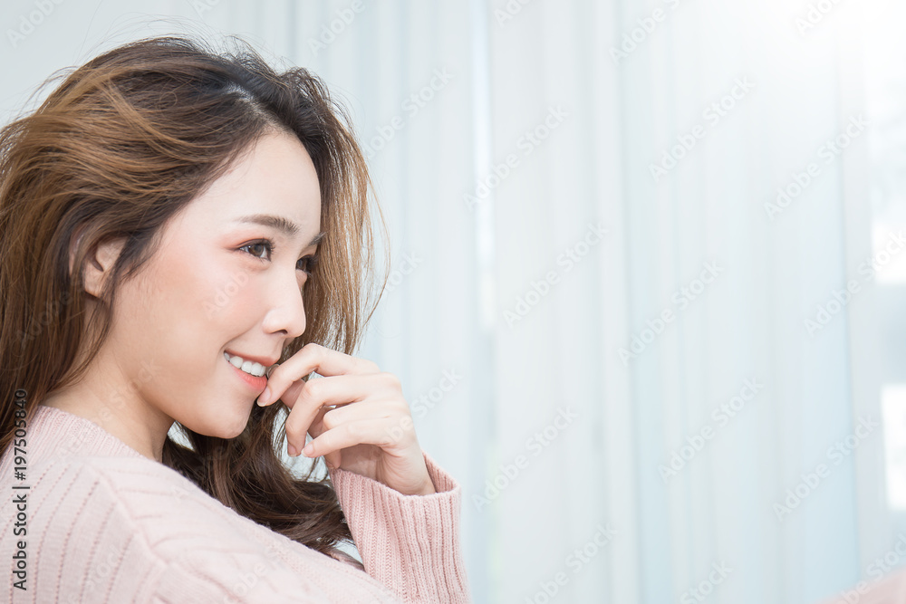 Portrait of young beautiful asian woman relax in her bedroom. Smile happy asian girl isolated on white background. Portrait of young beautiful asian woman relax in her bedroom. Smile happy asian girl isolated on white background.