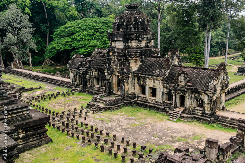 Amazing view of Angkor Wat is a temple complex in Cambodia and the largest religious monument in the world. Location: Siem Reap, Cambodia. Angkor Thom Amazing view of Angkor Wat is a temple complex in Cambodia and the largest religious monument in the world. Location: Siem Reap, Cambodia. Angkor Thom
