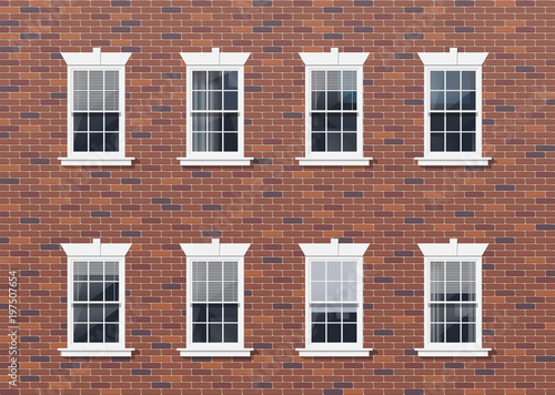 brick house facade wall with windows photo