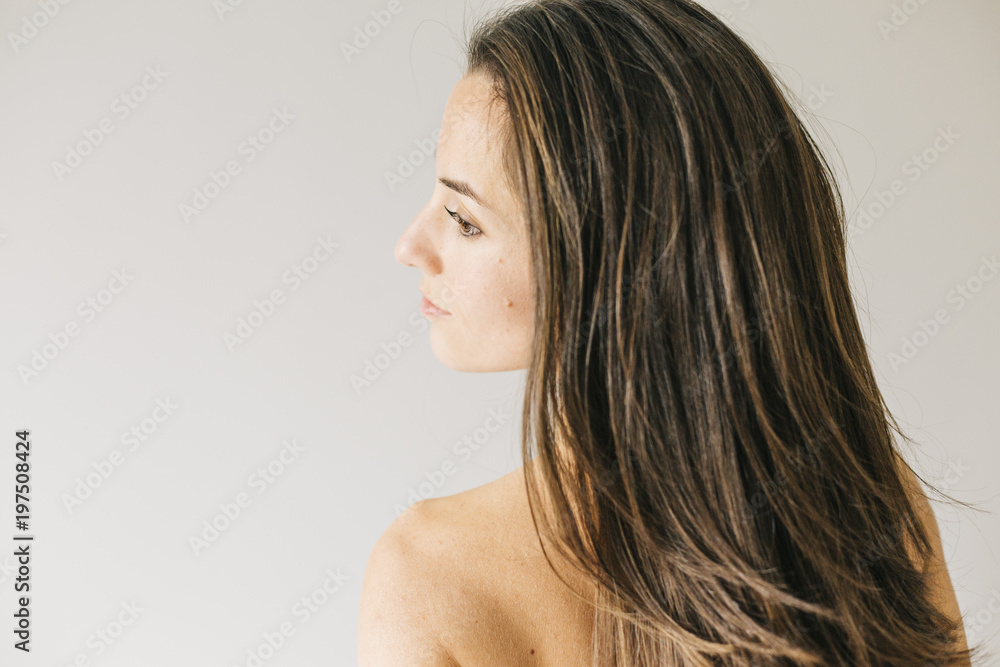 Naklejka premium young beautiful woman resting on bed. Lifestyle at home. Indoors. Portrait
