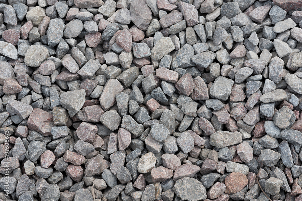 Grey river stone rock pattern texture background on wall Grey river stone rock pattern texture background on wall