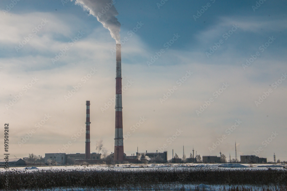 Smoke from the pipes of an industrial plant in the morning Smoke from the pipes of an industrial plant in the morning