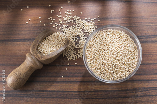 quinoa beans in bowl on rustic wooden background