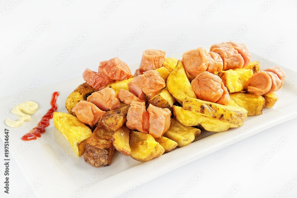 Salchipapa, typical dish of Peruvian cuisine based on Peruvian potatoes Salchipapa, typical dish of Peruvian cuisine based on Peruvian potatoes