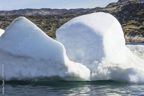 Giant Icebergs of Illulisat, Greenland, floating on water, a popular cruise destination